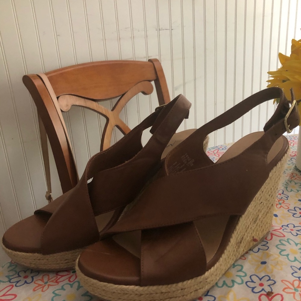 Super cute brown wedges. Only worn a few times.